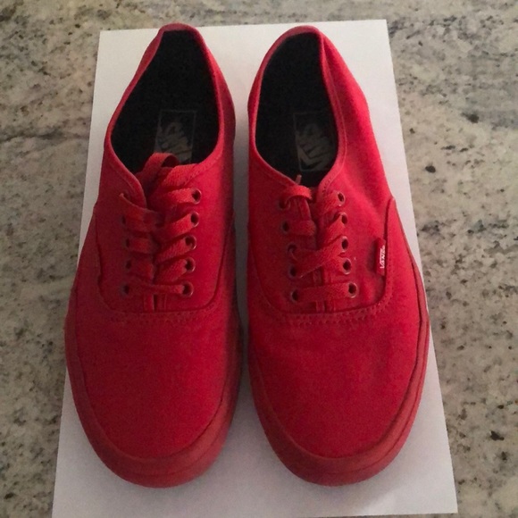 all red low top vans